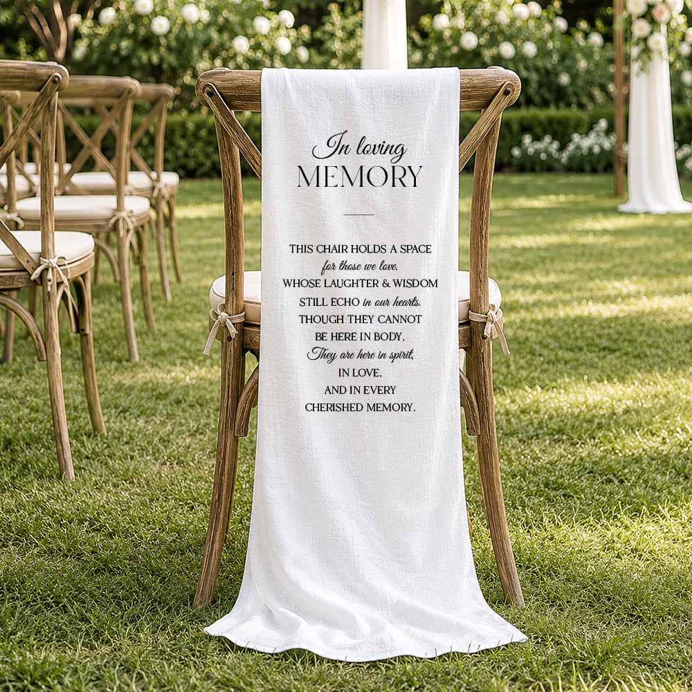 Timeless wedding memorial sign printed on linen fabric draping on a ceremony chair. In loving memory.