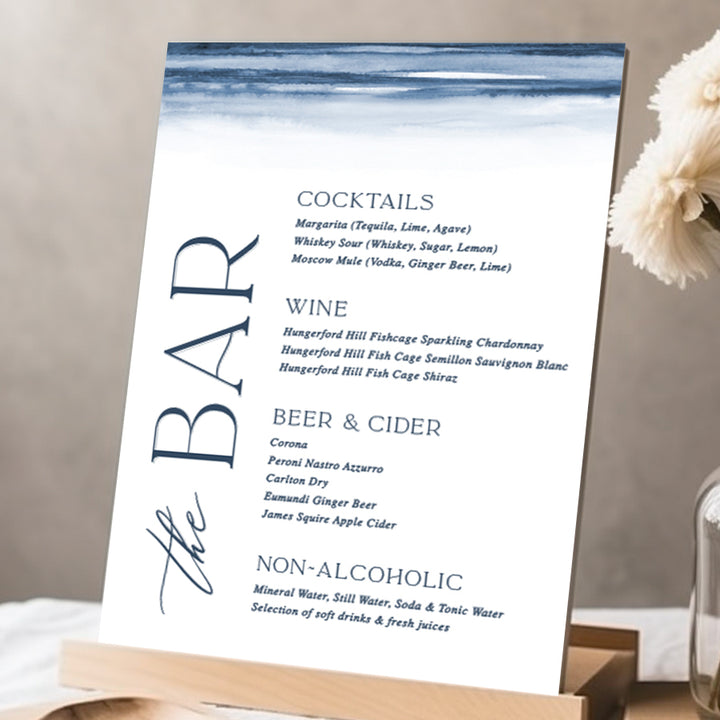 Beautiful wedding bar sign on table stand with watercolour navy blue wash printed on foamboard or acrylic in Australia. Peach Perfect Stationery.