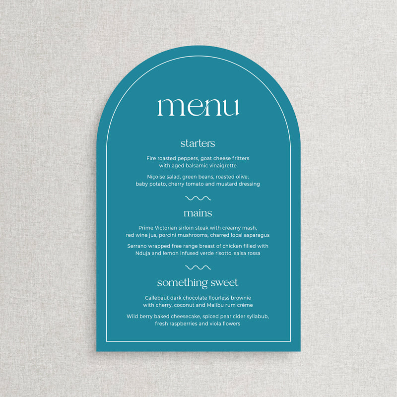 Modern arch shape wedding menu in sea green with round place cards. Printed in Australia by Peach Perfect.
