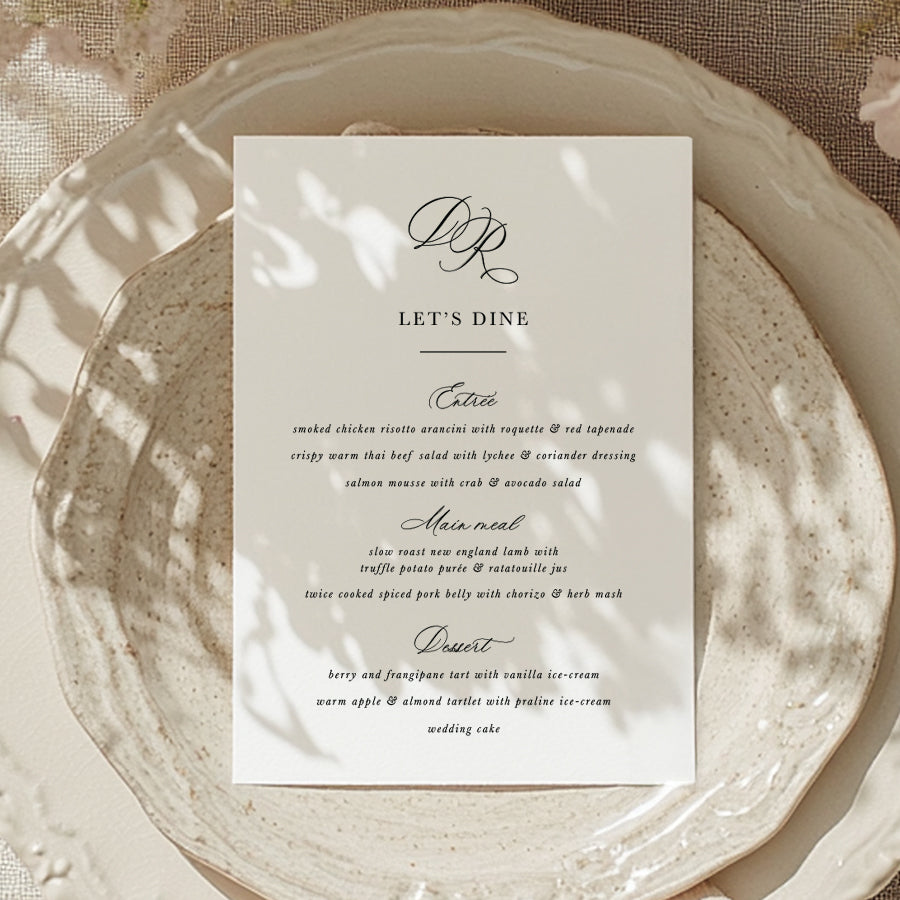 Romantic wedding menu with bride and groom initial monogram on beautiful dinner plate by Peach Perfect Stationery