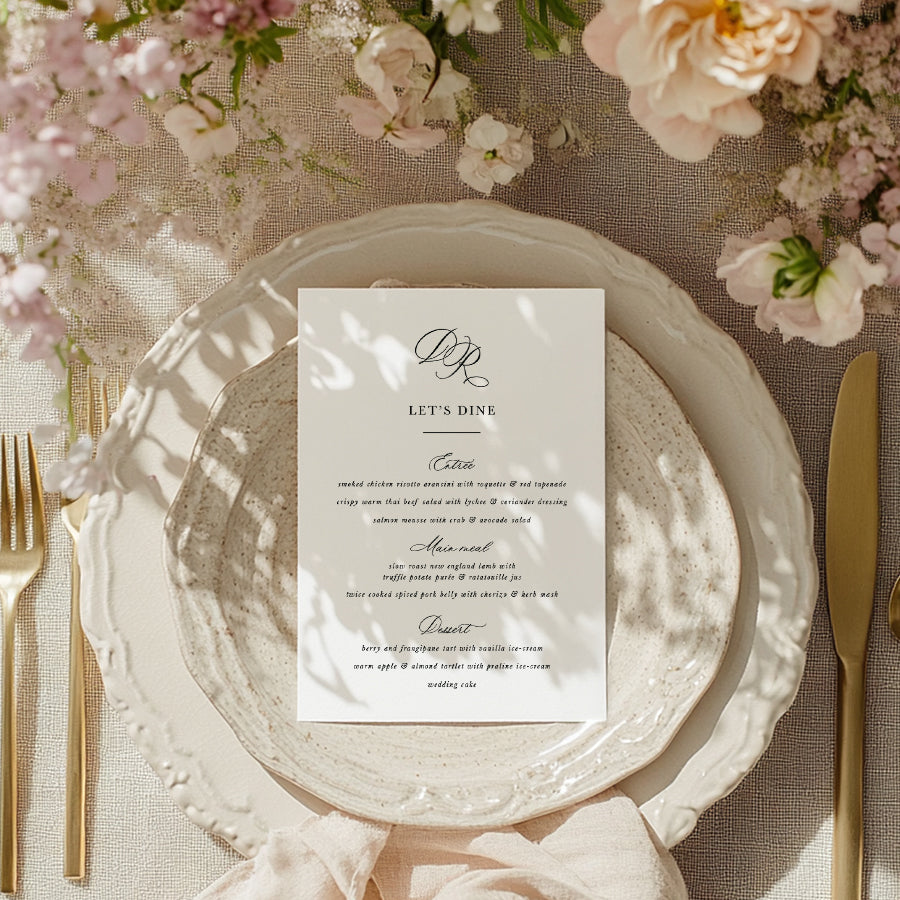 Romantic wedding menu with initial monogram on beautiful dinner plate