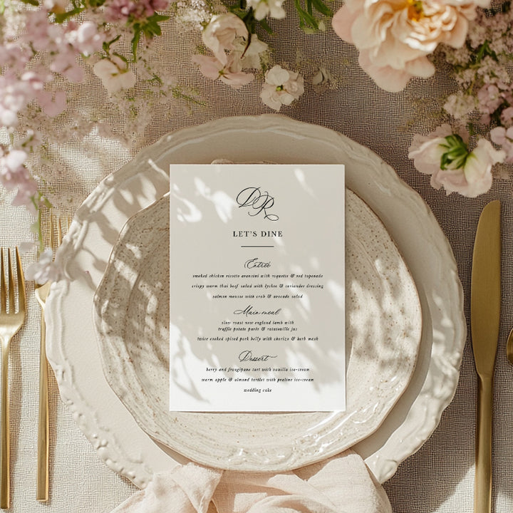 Romantic wedding menu with initial monogram on beautiful dinner plate