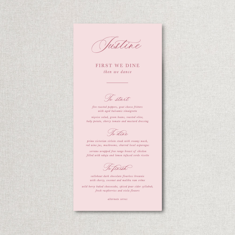 Blossom pink wedding menu with guest names and romantic calligraphy. First we dine heading, printed in Australia