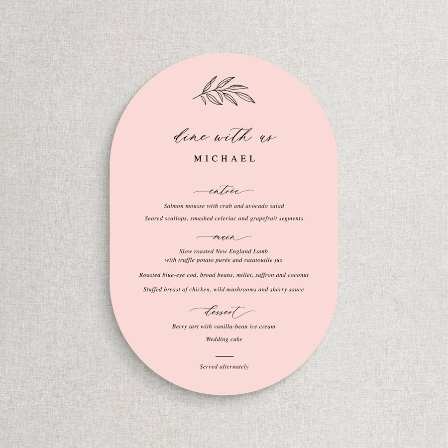 Double arch shape light pink wedding menu with traditional calligraphy font and hand drawn leaf detail. Peach Perfect Australia.