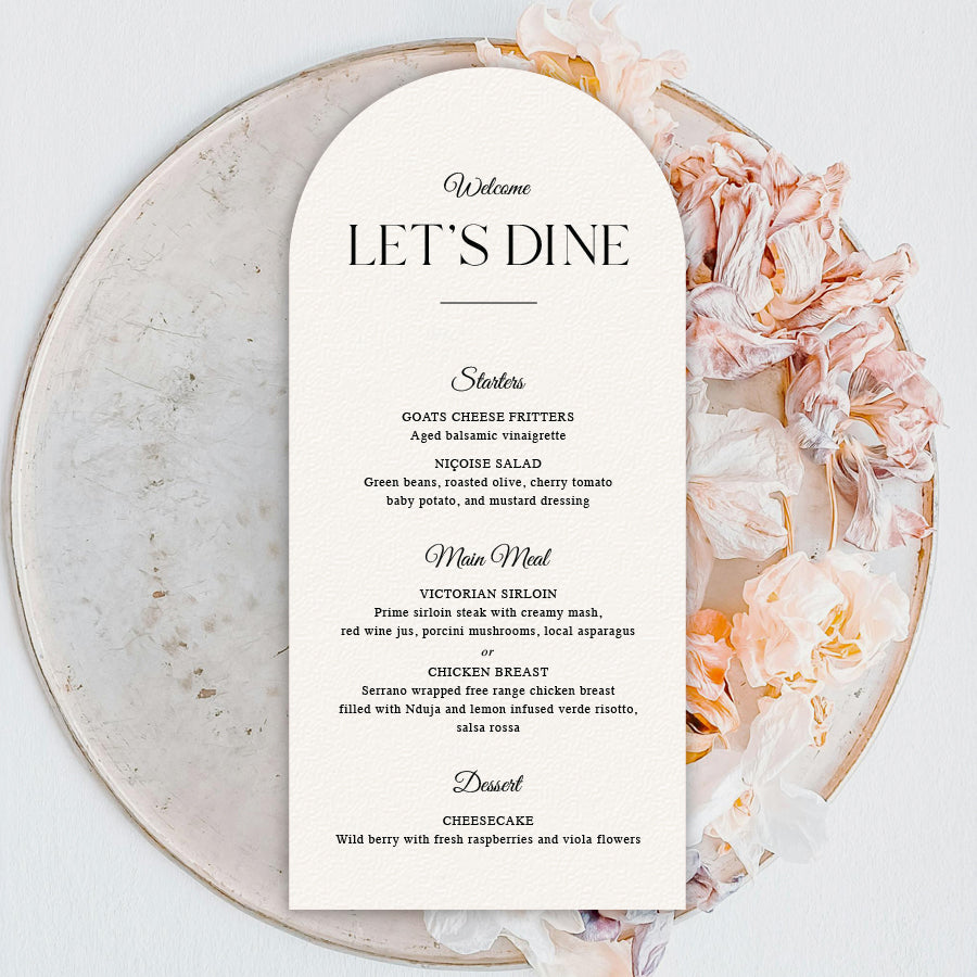 Elegant timeless calligraphy wedding menu in black and white with Lets Dine heading, and cut to DL arch shape. Designed and printed in Australia. 