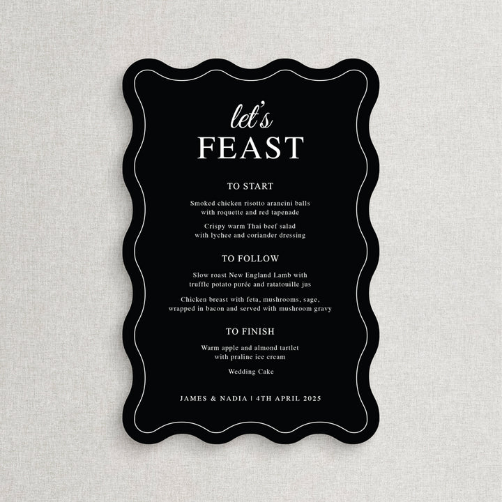 Modern black wedding menu with white ink die cut to wavy shape with lets feast heading.  Printed in Australia by Peach Perfect.