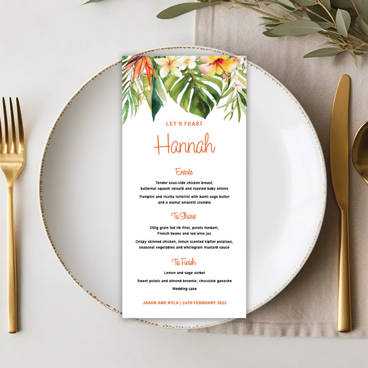 Tropical wedding or event menu with watercolour leaves and flowers and guest names printing. Peach Perfect Australia.
