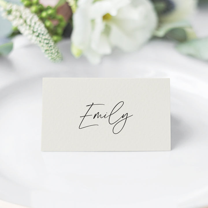 Traditional folded style wedding and event place cards with modern typography in soft white and black, printed in Australia.