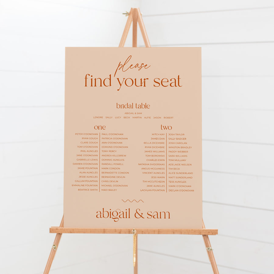 Modern retro wedding seating chart in peach or blush pink and burnt orange text. Designed and printed in Australia.
