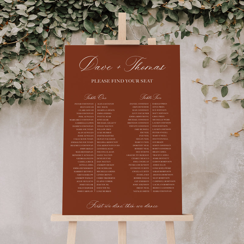 Wedding seating chart with traditional formal calligraphy style. First we dine, then we dance heading