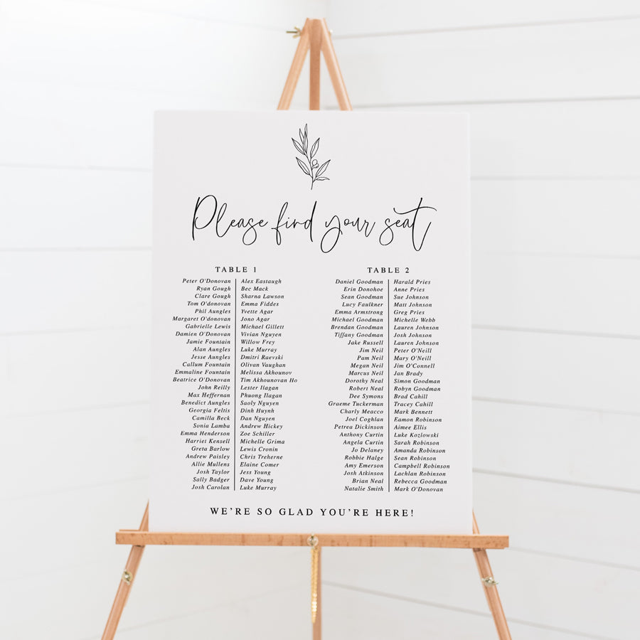 Wedding seating chart on foam board in green and white with hand drawn leaf element. Peach Perfect Australia.
