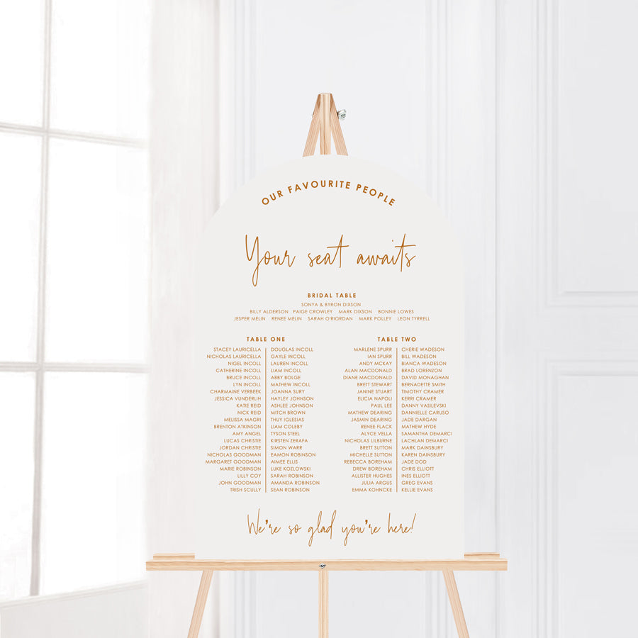 Modern arch wedding seating chart in soft pink and burnt orange. Designed and printed in Australia