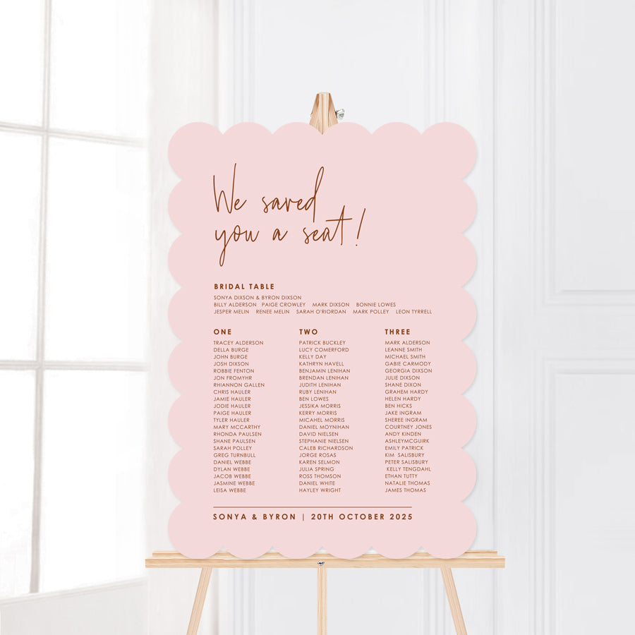Laser cut scallop edge wedding seating chart in soft pink and burnt orange. Designed and printed in Australia