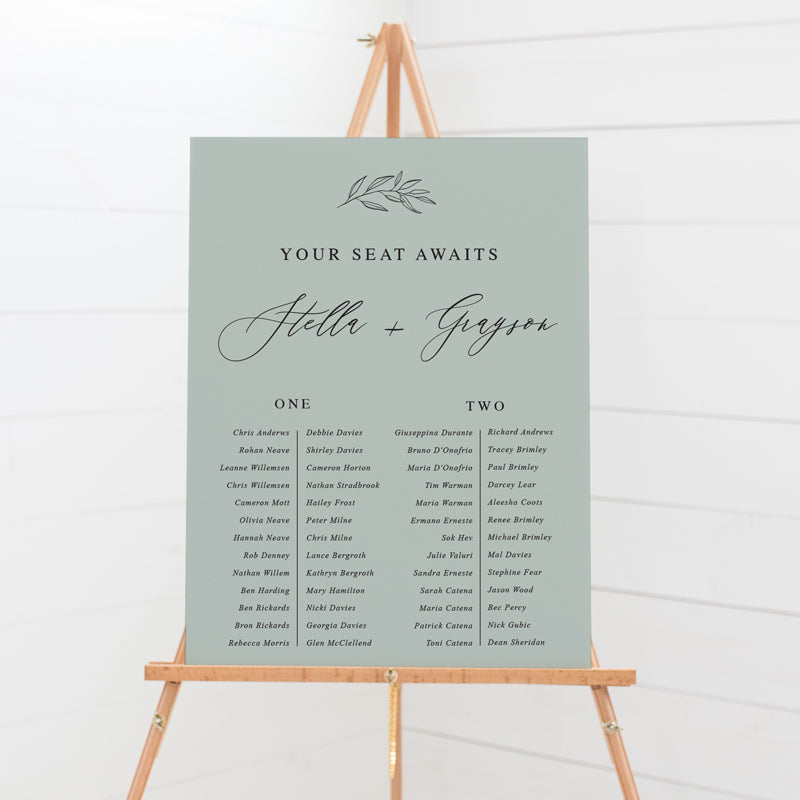 Beautiful wedding seating chart in mint green and white with hand drawn leaf element and callilgraphy. Peach Perfect Australia.
