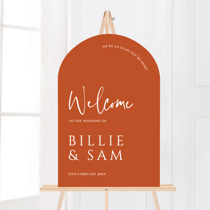 modern arch shape wedding welcome sign in bright burnt orange colours. Designed and printed in Australia.