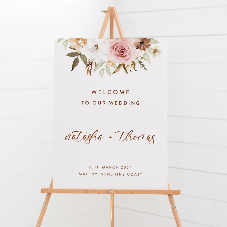 Floral wedding welcome sign with rust text and calligraphy font. Boho style florals. Peach Perfect Australia.
