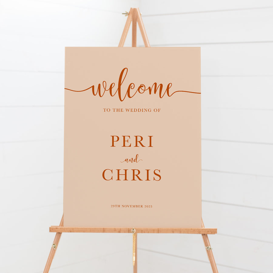 Wedding welcome sign with large welcome and modern swash font. Peach and burnt orange. Printed on foamboard or acrylic in Australia.