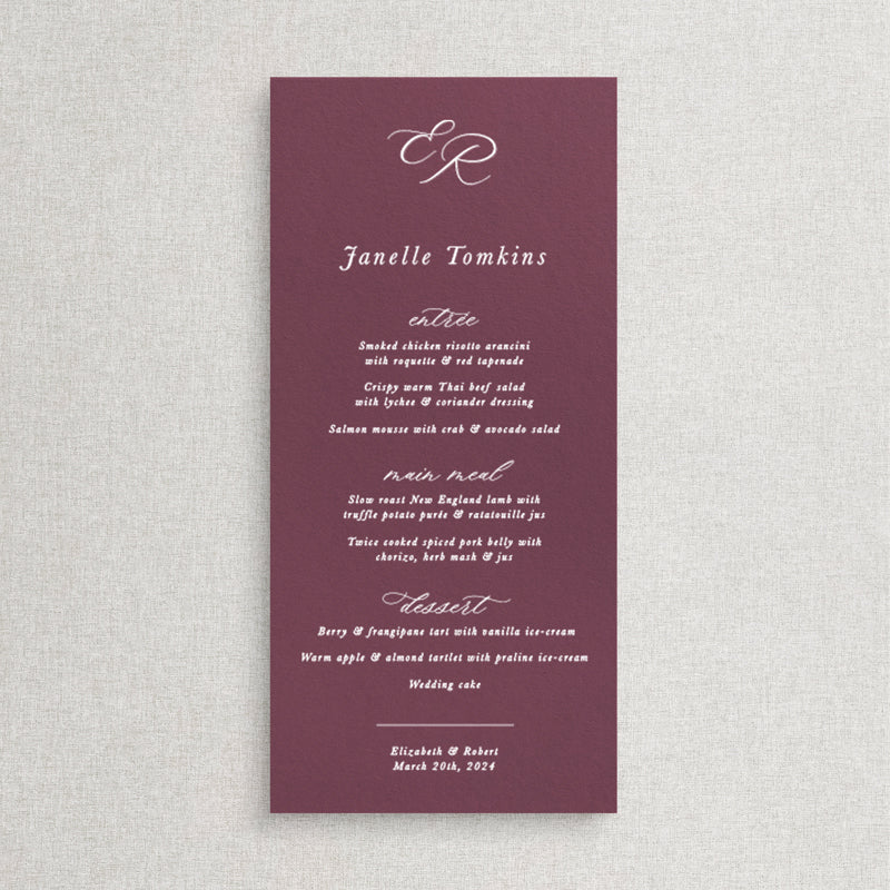 Traditional calligraphy wedding menu. Marsala or merlot coloured card with white ink printing and a monogram of bride and grooms initials. Peach Perfect Australia.