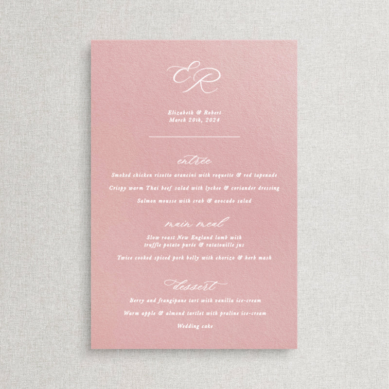Traditional calligraphy wedding menu. White ink printing on Rose pink card with a monogram of bride and grooms initials.