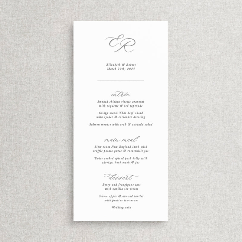 Traditional calligraphy wedding menu. White card with grey ink and a monogram of bride and grooms initials. Peach Perfect Australia.