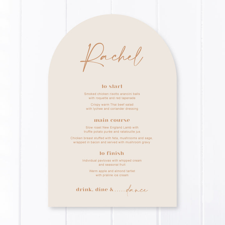 Modern arch shaped wedding menus printed in Australia, cinnamon printing on almond colour card with guest names on each menu.