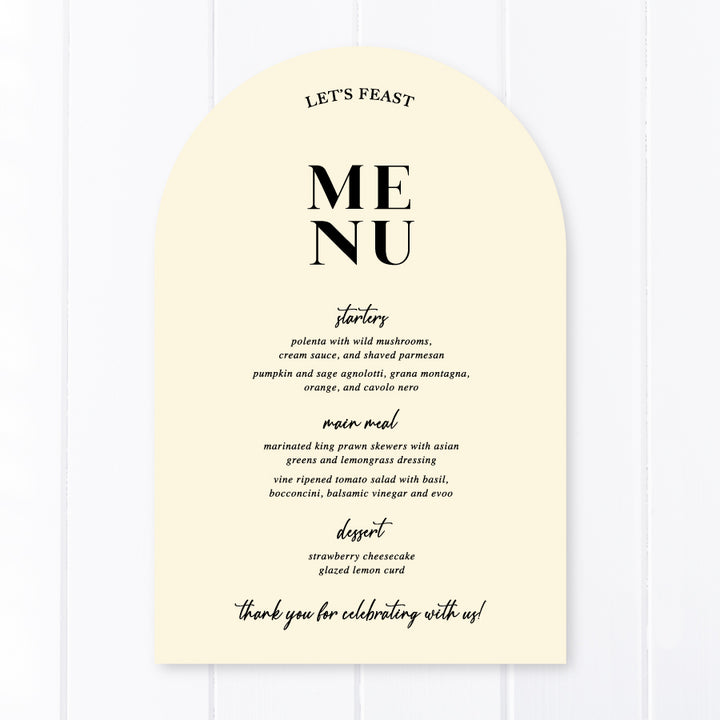 Modern arch wedding menu designed and printed in Australia with calligraphy font. Cream cardstock with Lets Feast for heading.