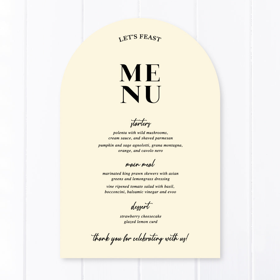 Modern arch wedding menu designed and printed in Australia with calligraphy font. Cream cardstock with Lets Feast for heading.