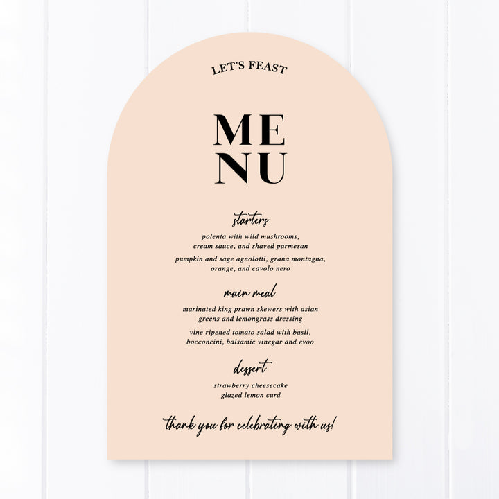 Modern arch wedding menu designed and printed in Australia with calligraphy font. Nude pink cardstock with Lets Feast for heading.