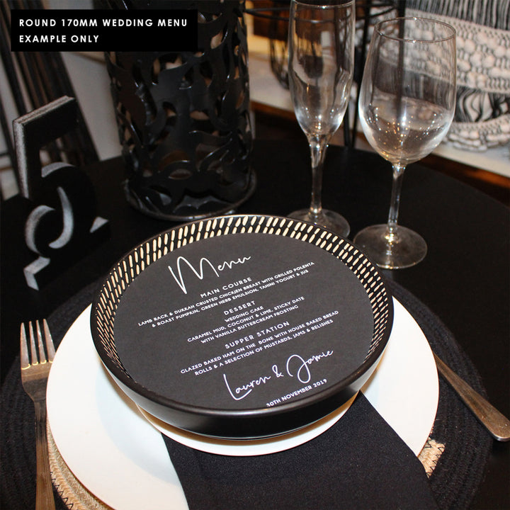 Beautiful round black and white wedding or christening event menu on charger plate. Designed and printed in Australia.