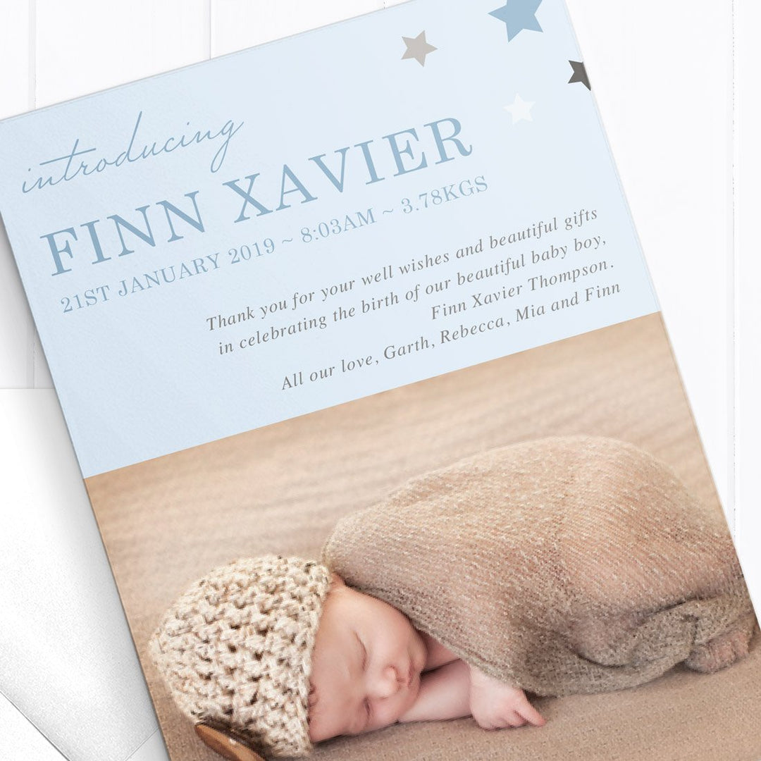Baby thank you announcement card, light blue with stars in corner