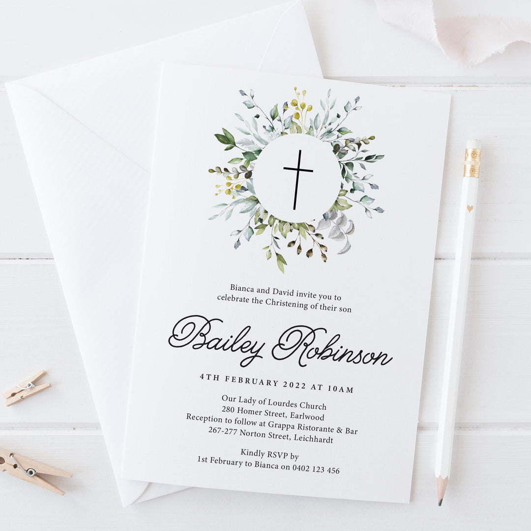 Boy Baptism invitation with delicate leaves surrounding cross and modern script font. Designed and printed in Australia