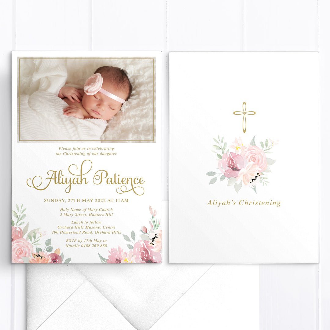 Baby girl photo baptism invitation with soft pink and apricot florals and greenery, and gold text. Designed and printed in Australia or print your own printable file.