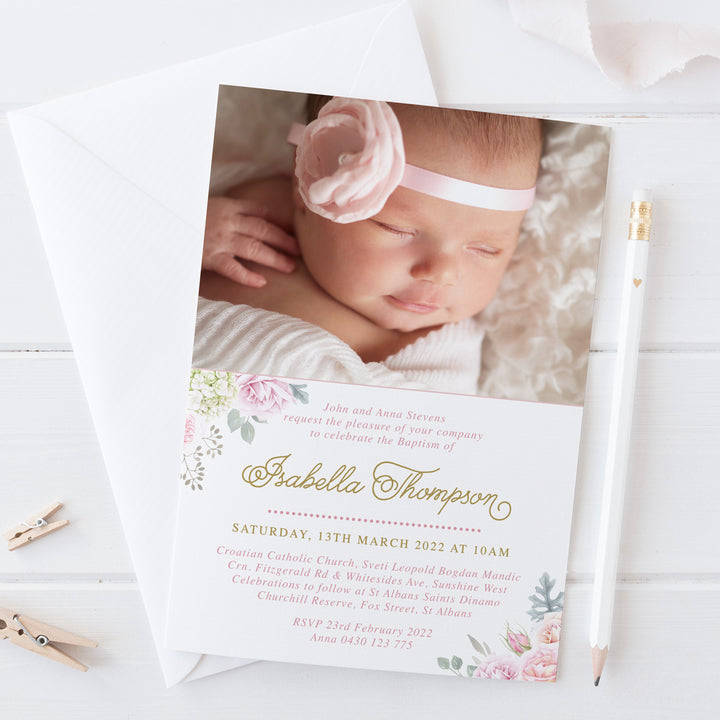 Baby girl photo baptism invitation with soft pink and apricot florals and greenery. Designed and printed in Australia or print your own printable file.
