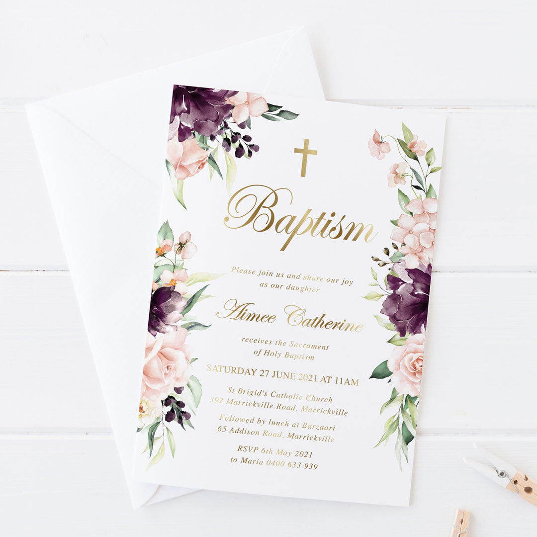 Gold foil baptism or christening invitation with soft pink and purple watercolour florals and decorative or catholic cross. Designed and printed in Australia.
