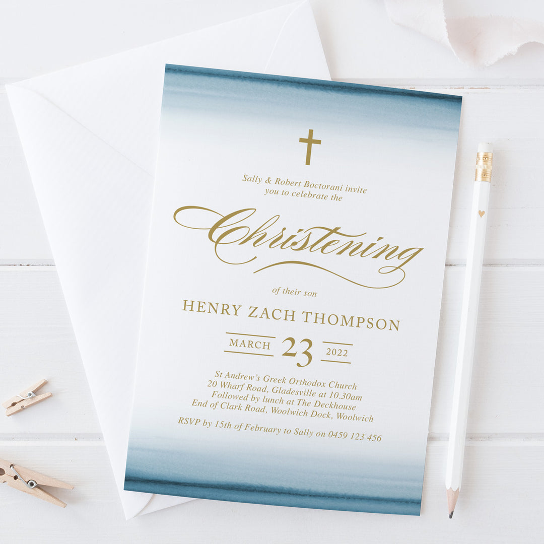 Christening invitation with blue watercolour wash and gold text in traditional style with calligraphy fonts, Australia