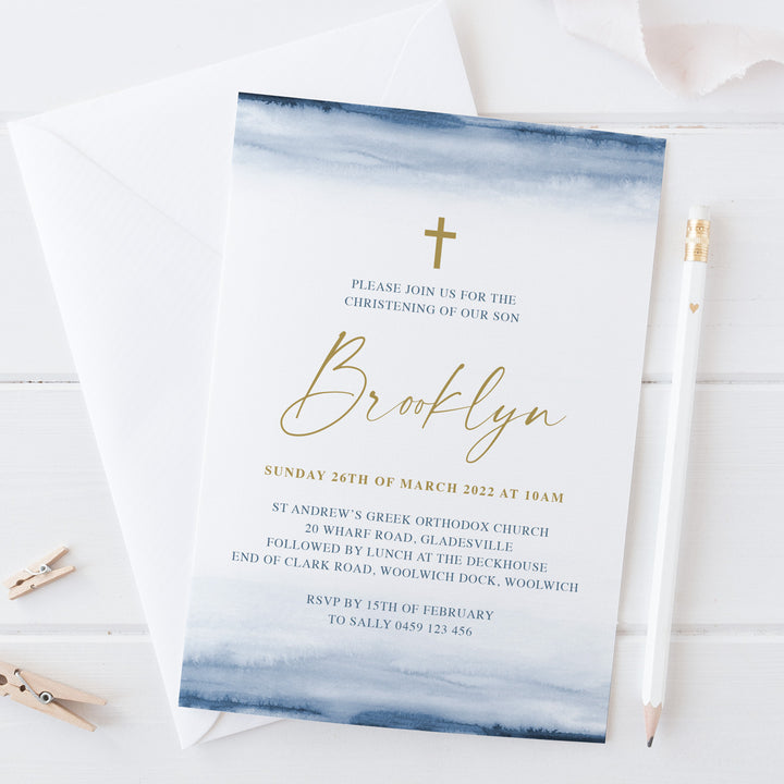 Baptism or christening invitation with navy blue background and gold cross and calligraphy