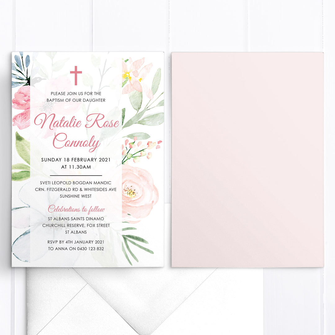 Beautiful baptism or christening invitation with soft pink and blue flowers and elegant calligraphy text and catholic cross in pink.