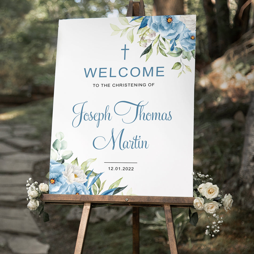 Baptism welcome signboard for boy or girl with blue and white florals and greenery in corners, with calligraphy font. Printed in Australia or printable Christening welcome signs.