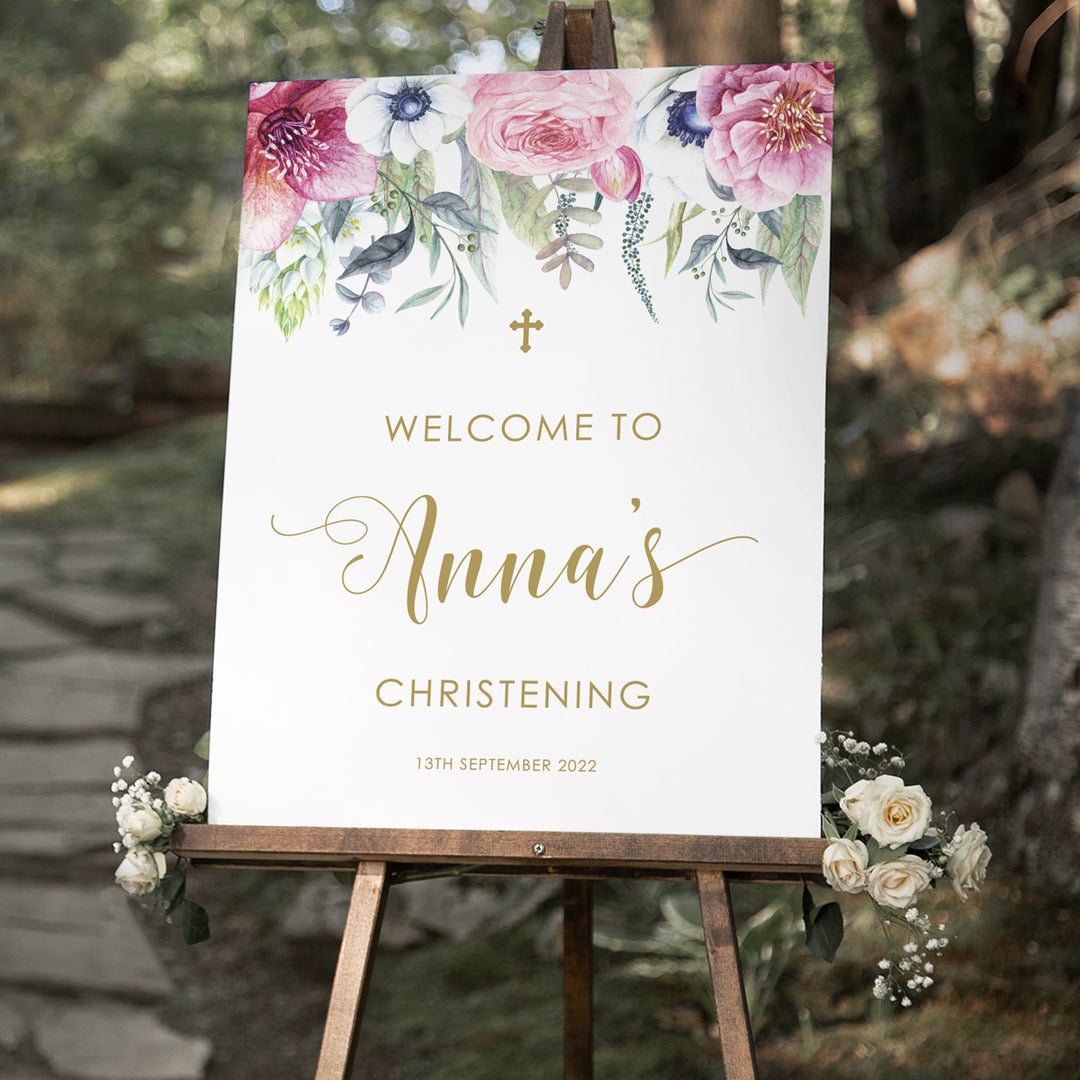 Baptism welcome sign for girl with pink floral border and greenery at the top and name in gold calligraphy font. Printed in Australia or printable Christening welcome signs.