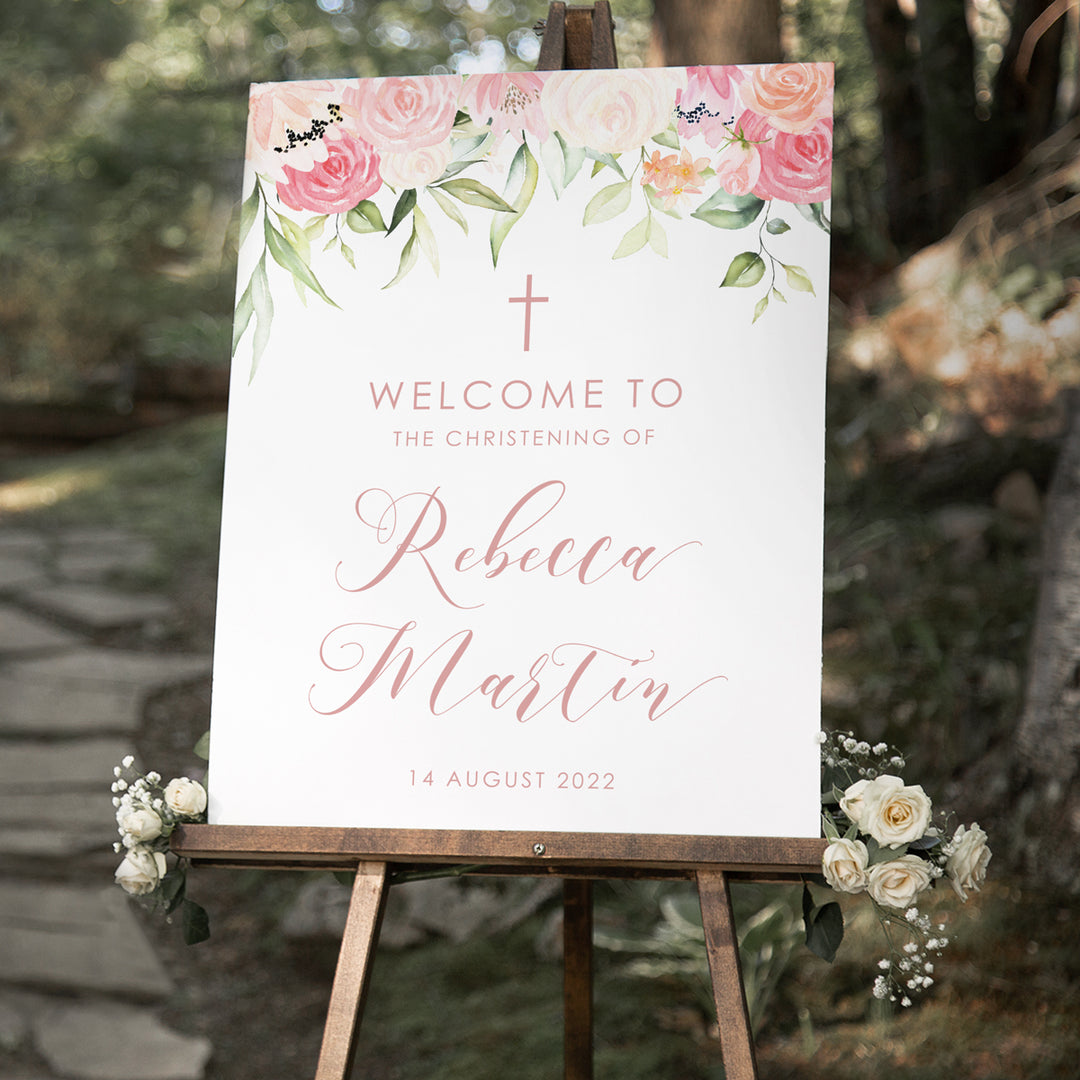 Baptism or christening welcome sign features a beautiful soft blush and pink watercolour corner florals and calligraphy font. Printed in Australia on board for mounting to easel.