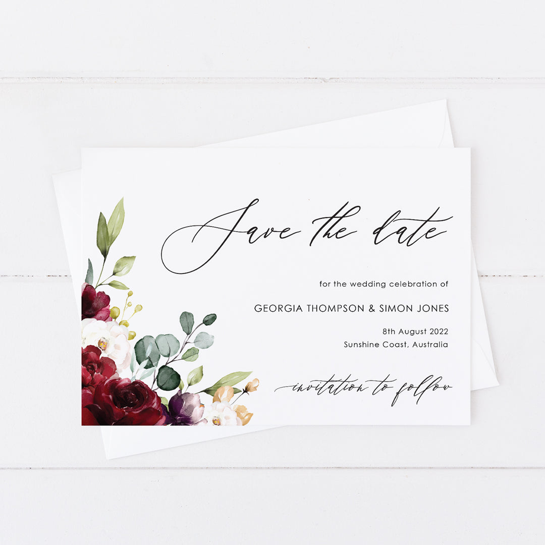 Wedding save the date card, red florals and foliage and modern calligraphy font for names