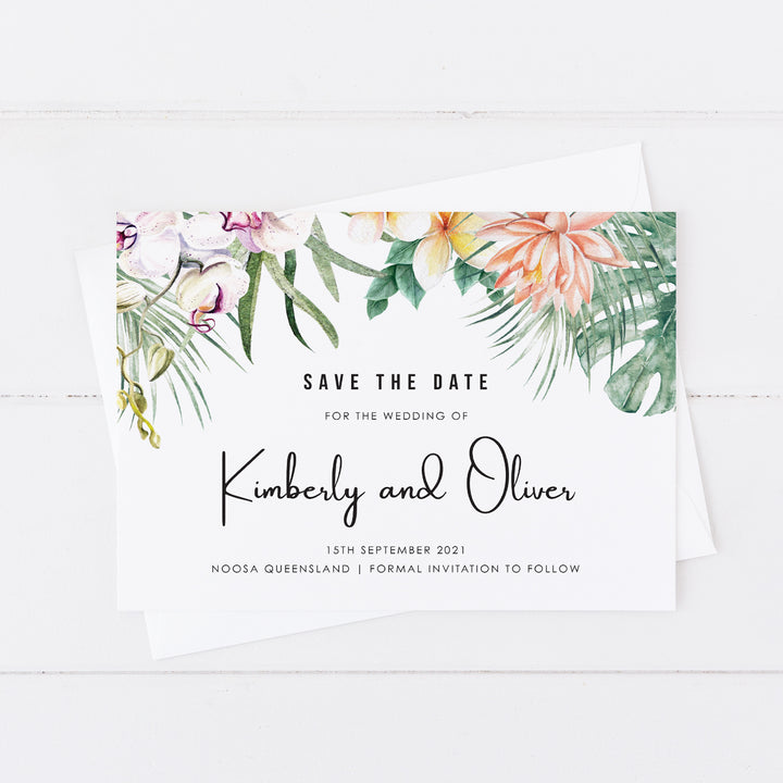Tropical wedding save the date card with flowers and foliage with modern script font style 