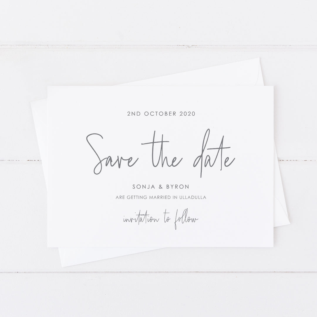 Simplistic wedding save the date card with matching invitation suite in grey and white