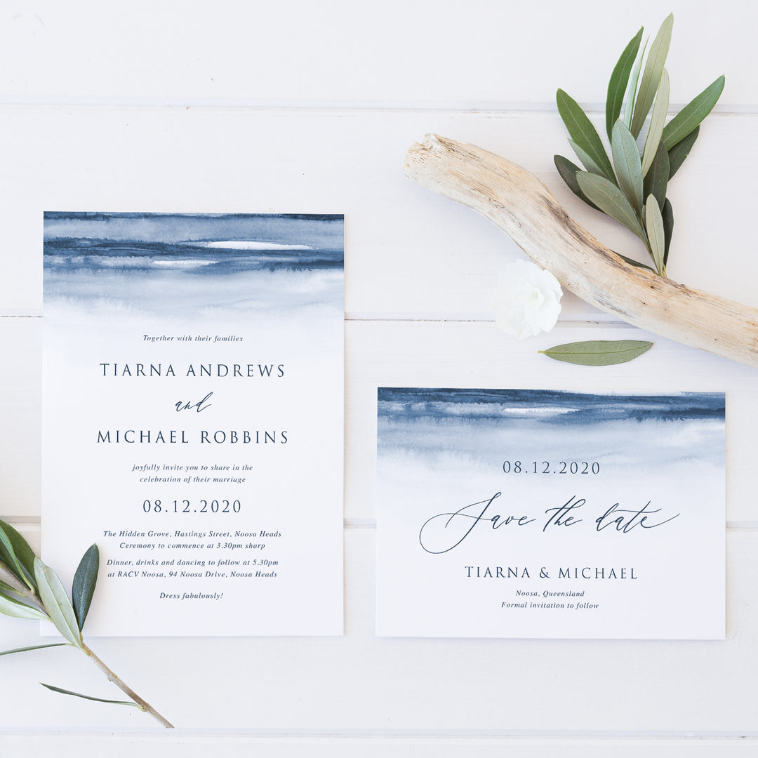 Wedding save the date with calligraphy font and navy blue watercolour background