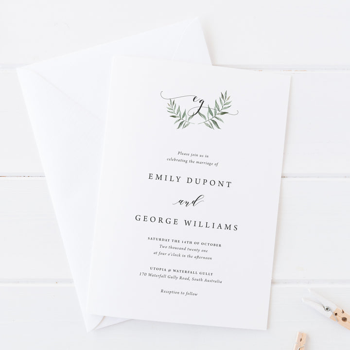 Wedding save the date card, minimal style, green leaf wreath and monogram