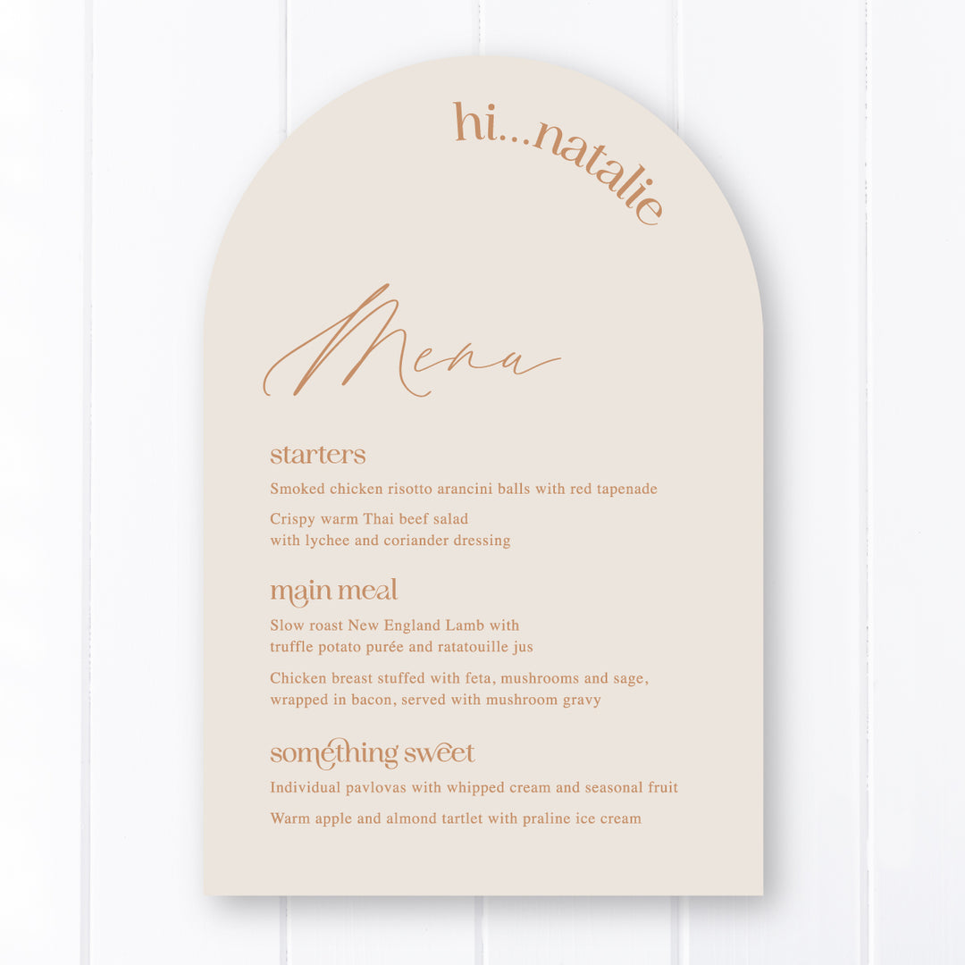 Modern arch wedding menu on almond cardstock with cinnamon coloured text and guest name printing.