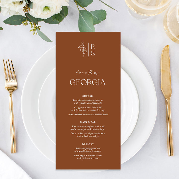 Modern monogram wedding menu with hand drawn leaf. White ink on Harvest or Terracotta cardstock. Peach Perfect Australia.