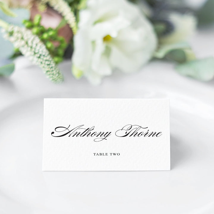 Black and white folded wedding place cards with calligraphy font 