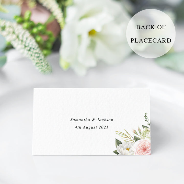 Wedding place cards with soft pink and apricot flowers and greenery, and beautiful calligraphy font in gold