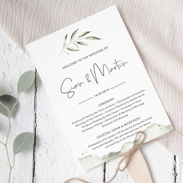 Rustic wedding program with watercolour leaf in soft deep green